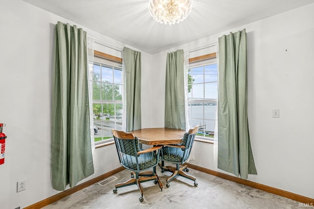 7205 N 1150 W, Shipshewana, IN 46565 - dining room with plenty of natural light, baseboards, and a chandelier