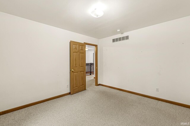 7205 N 1150 W, Shipshewana, IN 46565 - spare room featuring baseboards and light carpet