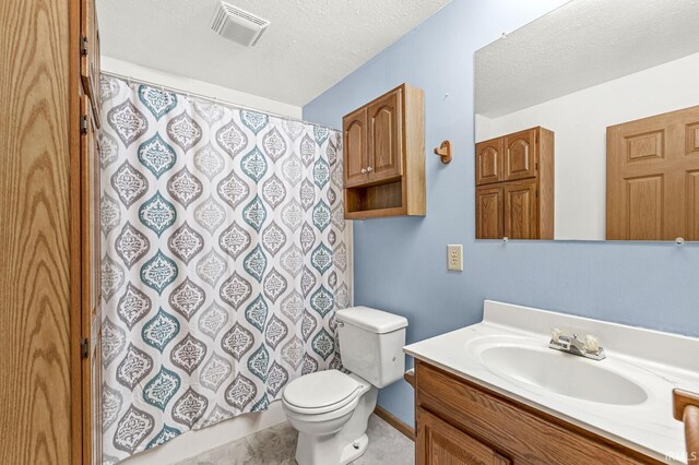 7205 N 1150 W, Shipshewana, IN 46565 - bathroom with vanity, toilet, a textured ceiling, and curtained shower