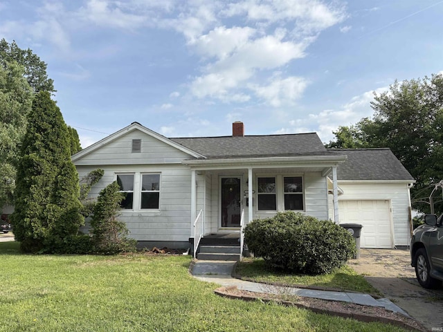 1713 E Illinois St, Evansville, IN 47711 - view of front of property with an attached garage, a chimney, a front lawn, a shingled roof, and covered porch