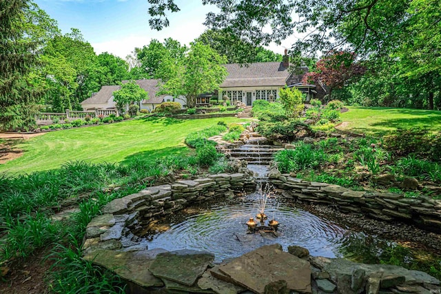 703 Pfeiffer Rd, Evansville, IN 47711 - view of green lawn featuring a small pond