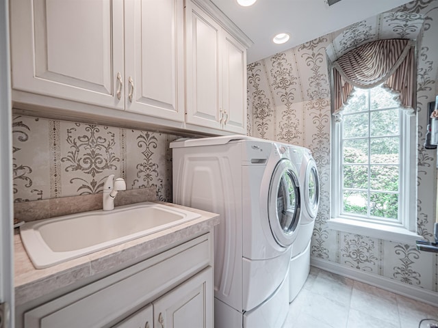 703 Pfeiffer Rd, Evansville, IN 47711 - washroom with wallpapered walls, cabinet space, washing machine and clothes dryer, baseboards, and recessed lighting