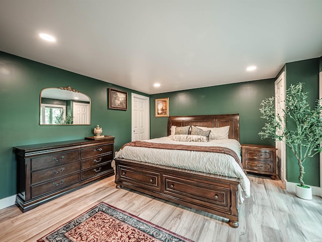 703 Pfeiffer Rd, Evansville, IN 47711 - bedroom featuring light wood-style floors, recessed lighting, and baseboards