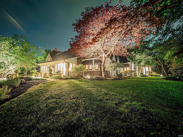703 Pfeiffer Rd, Evansville, IN 47711 - back of house with a yard and a chimney