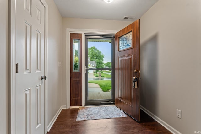 32840 Morning Dove Ct, New Carlisle, IN 46552 - foyer entrance featuring dark wood finished floors and baseboards