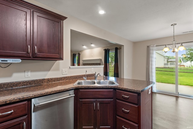 32840 Morning Dove Ct, New Carlisle, IN 46552 - kitchen featuring stainless steel dishwasher, a sink, dark countertops, a peninsula, and recessed lighting