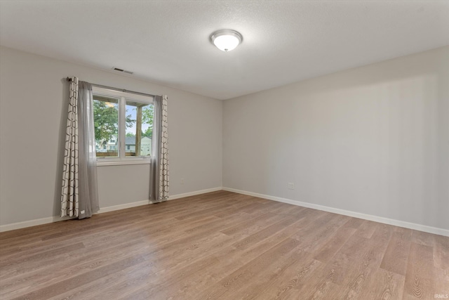 32840 Morning Dove Ct, New Carlisle, IN 46552 - empty room with light wood-type flooring and baseboards