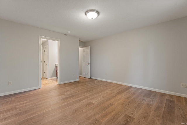 32840 Morning Dove Ct, New Carlisle, IN 46552 - empty room with light wood finished floors and baseboards