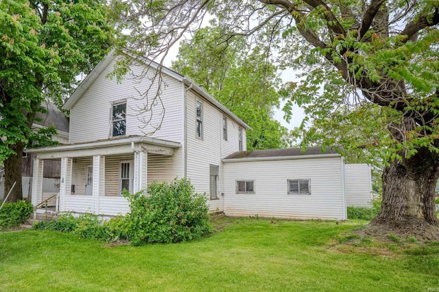 104 S Cowen St, Garrett, IN 46738 - rear view of house with a yard and a porch