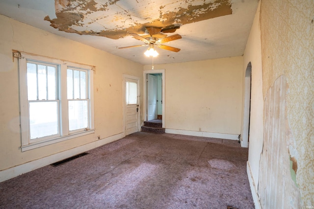 104 S Cowen St, Garrett, IN 46738 - empty room with a ceiling fan and carpet flooring