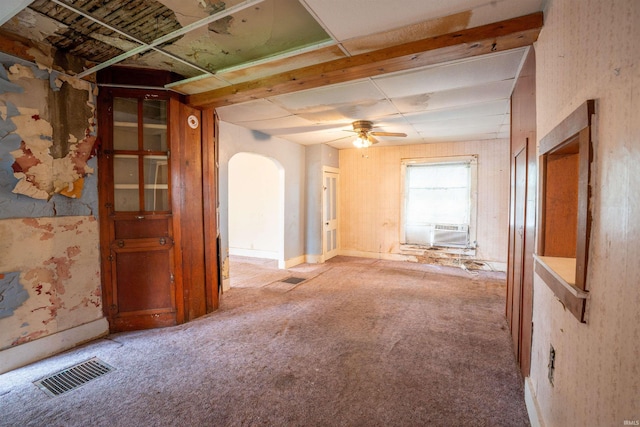 104 S Cowen St, Garrett, IN 46738 - spare room with arched walkways, ceiling fan, carpet, and cooling unit
