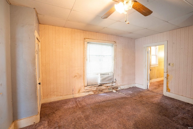 104 S Cowen St, Garrett, IN 46738 - spare room featuring a paneled ceiling, ceiling fan, carpet floors, cooling unit, and baseboards