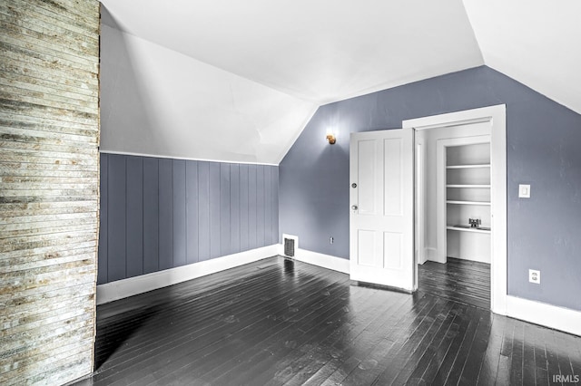 1258 N Main St, Nappanee, IN 46550 - bonus room featuring lofted ceiling, wood-type flooring, baseboards, and wooden walls