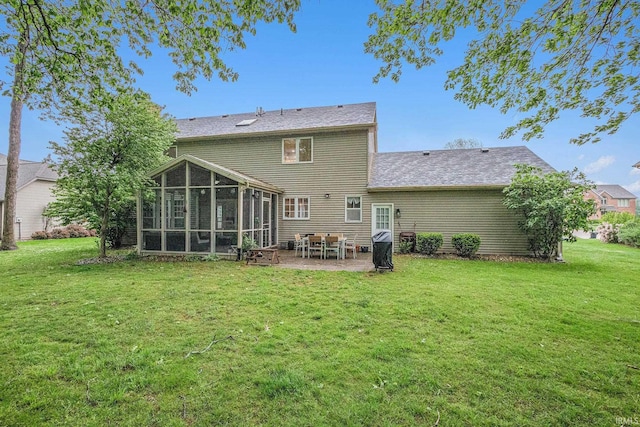51695 Fox Pointe Ln, Granger, IN 46530 - rear view of house featuring a sunroom, a yard, and a patio