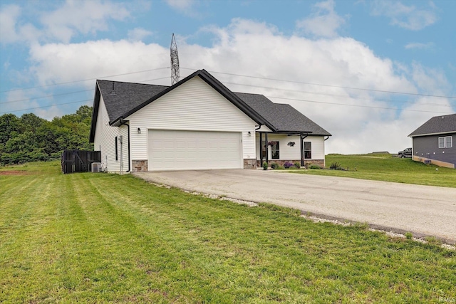 4022 Eagle Dr, Gosport, IN 47433 - view of front of property with driveway, an attached garage, a front lawn, stone siding, and roof with shingles
