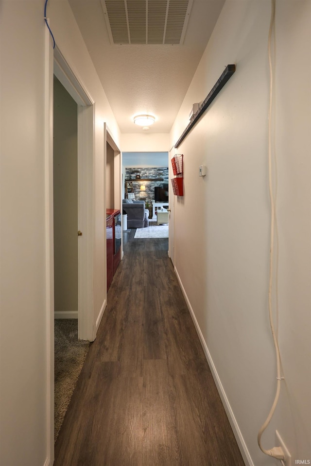 110 Alan Dr, Fremont, IN 46737 - hall featuring dark wood-style floors and baseboards