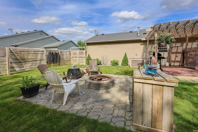 110 Alan Dr, Fremont, IN 46737 - view of patio / terrace with an outdoor fire pit