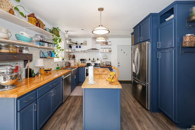 110 Alan Dr, Fremont, IN 46737 - kitchen featuring wooden counters, blue cabinetry, appliances with stainless steel finishes, open shelves, and a kitchen island