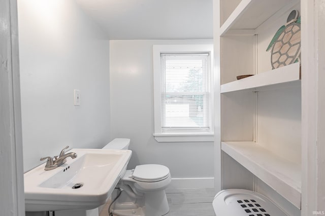 1471 Vernon St, Wabash, IN 46992 - half bath featuring a sink, toilet, and baseboards