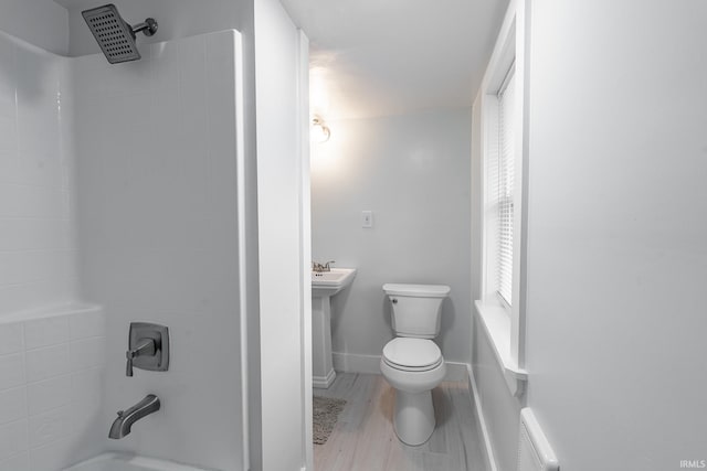 1471 Vernon St, Wabash, IN 46992 - full bath with toilet, tub / shower combination, wood finished floors, and baseboards