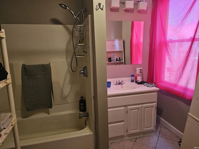 58 E 5th St, Peru, IN 46970 - bathroom featuring vanity, tile patterned floors, and washtub / shower combination