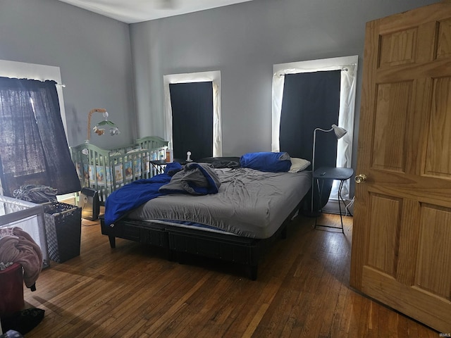58 E 5th St, Peru, IN 46970 - bedroom featuring wood-type flooring
