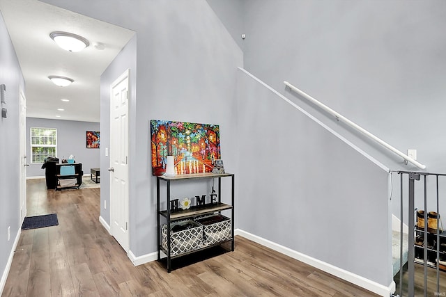 7228 W Mustang Dr, Ellettsville, IN 47429 - hall with wood finished floors and baseboards