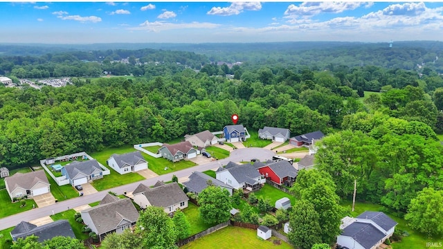 7228 W Mustang Dr, Ellettsville, IN 47429 - aerial perspective of suburban area with a heavily wooded area