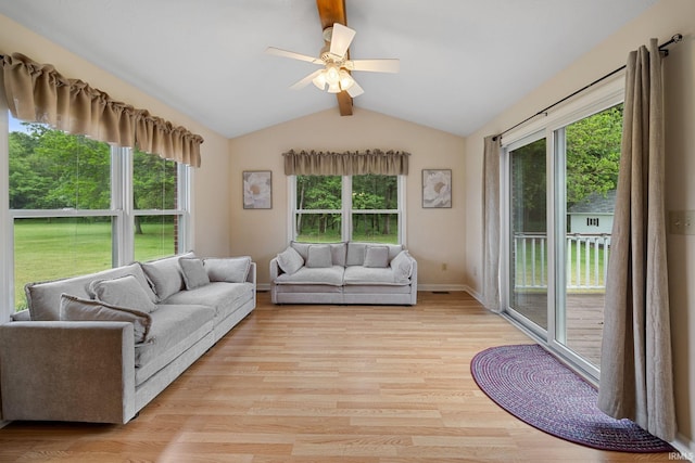 4170 W 500 N, Wolcott, IN 47995 - living room with healthy amount of natural light, a ceiling fan, and light wood-type flooring