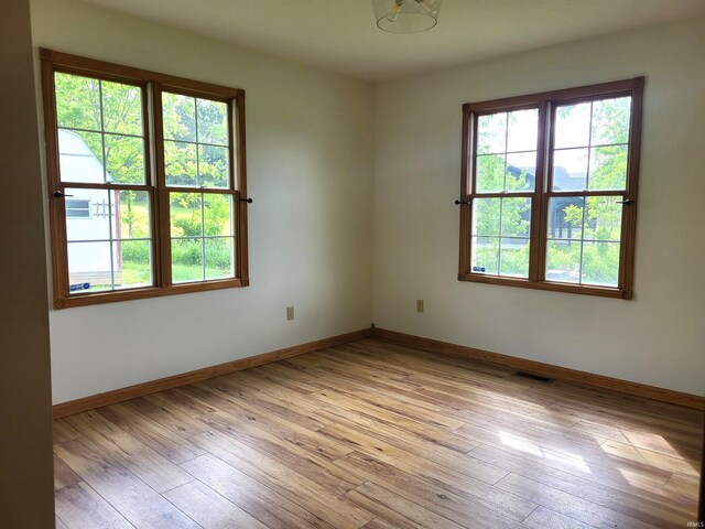 104 Leatherwood Creek Ests, Bedford, IN 47421 - spare room with light wood-type flooring and baseboards