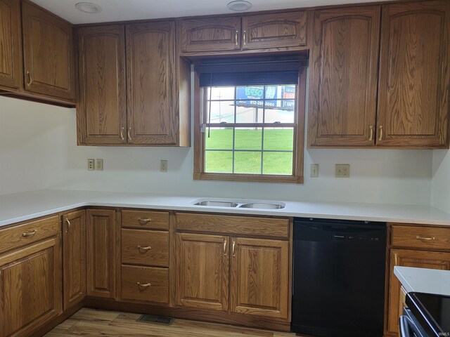 104 Leatherwood Creek Ests, Bedford, IN 47421 - kitchen featuring dishwasher and brown cabinets
