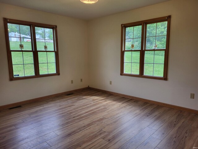 104 Leatherwood Creek Ests, Bedford, IN 47421 - unfurnished room featuring wood finished floors and baseboards