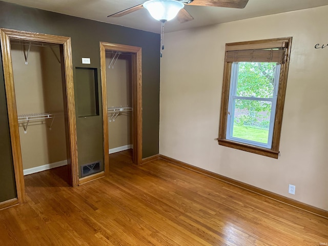 815 3rd St, Huntingburg, IN 47542 - unfurnished bedroom with light wood-style flooring and baseboards