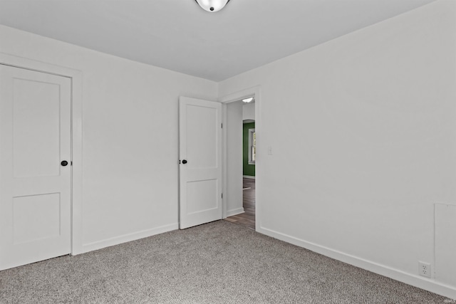 112 W Monroe St, Alexandria, IN 46001 - carpeted empty room with baseboards
