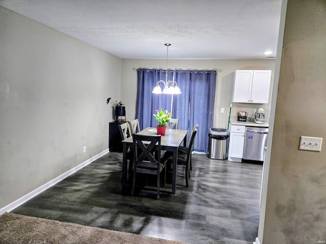 405 Ariel Dr, Kokomo, IN 46901 - dining space featuring a chandelier and baseboards