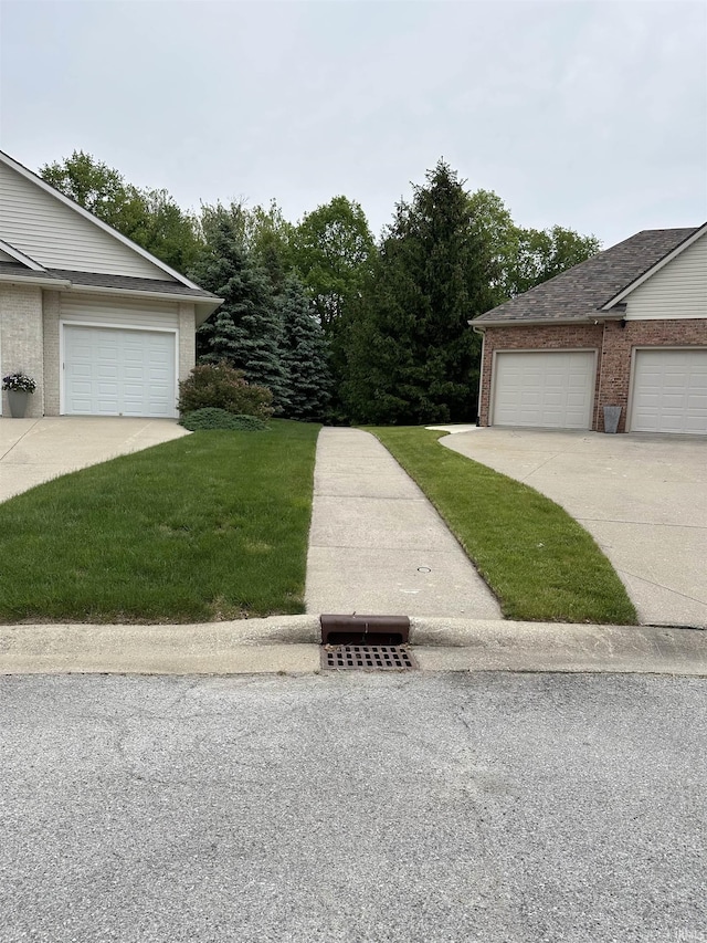 7019 Tree Top Trl, Fort Wayne, IN 46845 - exterior space with brick siding, a front yard, and roof with shingles
