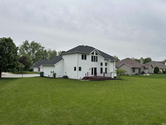 7019 Tree Top Trl, Fort Wayne, IN 46845 - back of property featuring a yard and a deck