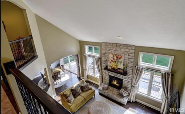 21562 Golden Maple Dr, South Bend, IN 46628 - living area with a stone fireplace and vaulted ceiling