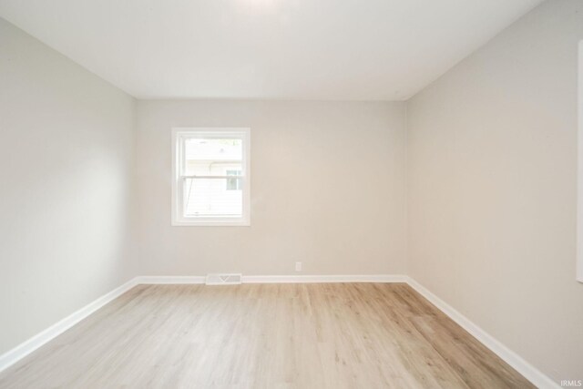 2726 Apache Dr, Anderson, IN 46012 - unfurnished room with light wood-type flooring and baseboards