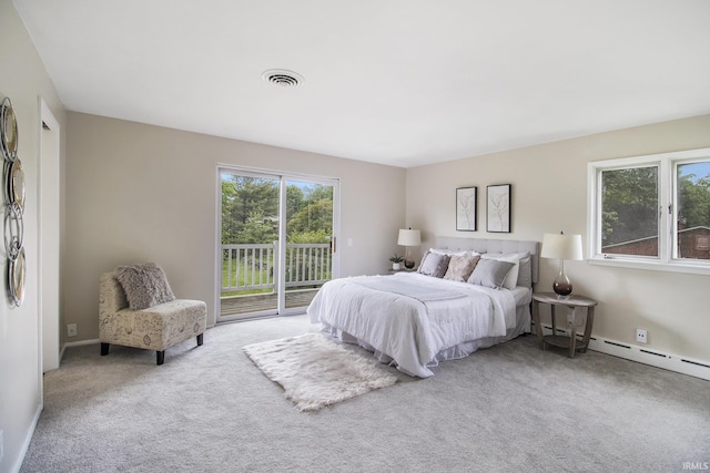 17330 Mcerlain St, South Bend, IN 46635 - carpeted bedroom with access to outside and a baseboard radiator