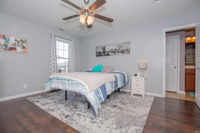 12908 Mattison Ct, Evansville, IN 47725 - bedroom featuring baseboards and a ceiling fan