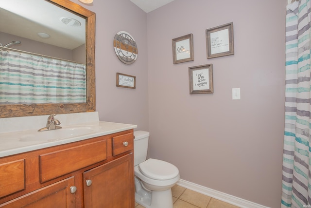 12908 Mattison Ct, Evansville, IN 47725 - full bathroom with toilet, vanity, tile patterned floors, and baseboards
