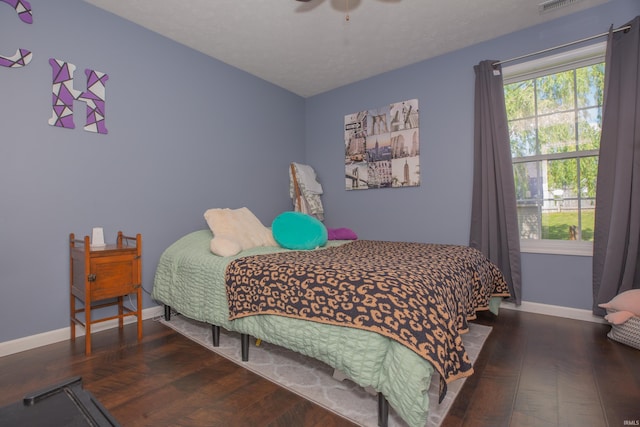 12908 Mattison Ct, Evansville, IN 47725 - bedroom featuring wood finished floors, baseboards, and a ceiling fan