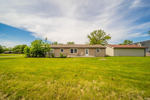 6863 W Jennifer Ct, Greenfield, IN 46140 - rear view of house featuring a yard