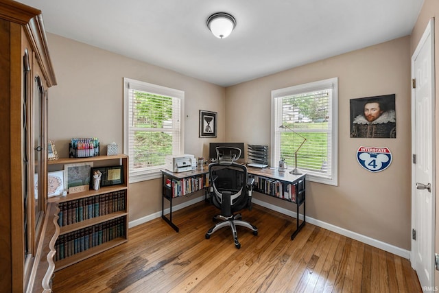 1905 Inglewood Pl, South Bend, IN 46616 - home office featuring hardwood / wood-style flooring and baseboards