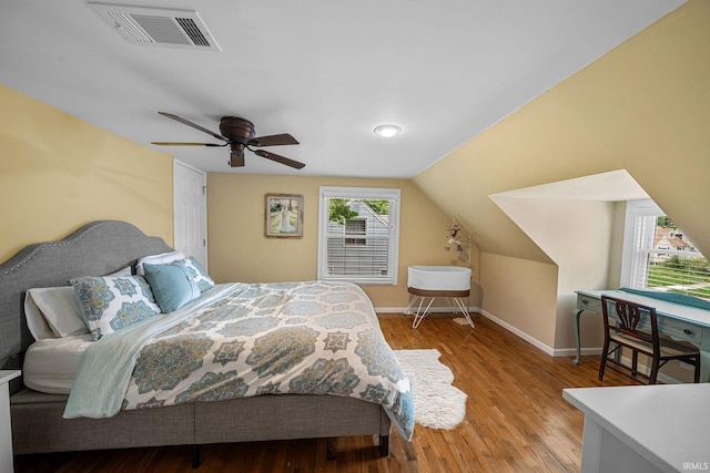 1905 Inglewood Pl, South Bend, IN 46616 - bedroom with wood finished floors, baseboards, lofted ceiling, and ceiling fan