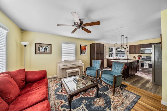 1905 Inglewood Pl, South Bend, IN 46616 - living area with ceiling fan and dark wood finished floors