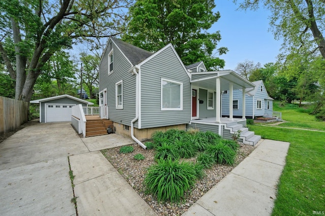 1905 Inglewood Pl, South Bend, IN 46616 - bungalow featuring a porch, an outdoor structure, and a garage