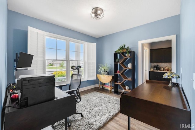 2696 Maraquita Ct, Fort Wayne, IN 46845 - office area featuring wood finished floors and baseboards