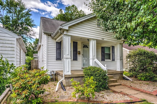 1521 Monroe Ave, Evansville, IN 47714 - view of front facade with roof with shingles and a porch